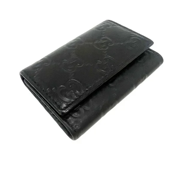 GUCCI: Black Monogram Guccissima Leather Key Case #1299